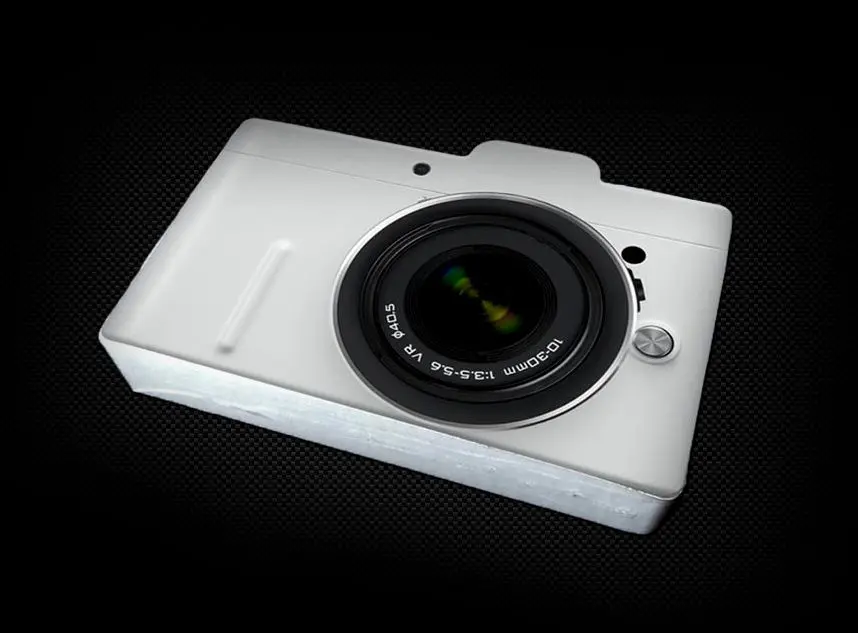 Tricouri comprimate in forma de aparat foto